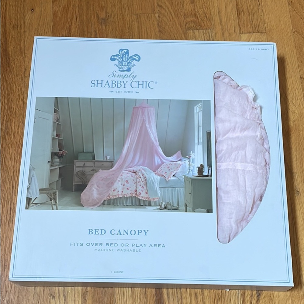 New in box shabby chic bed canopy. Will need to take out of box to ship